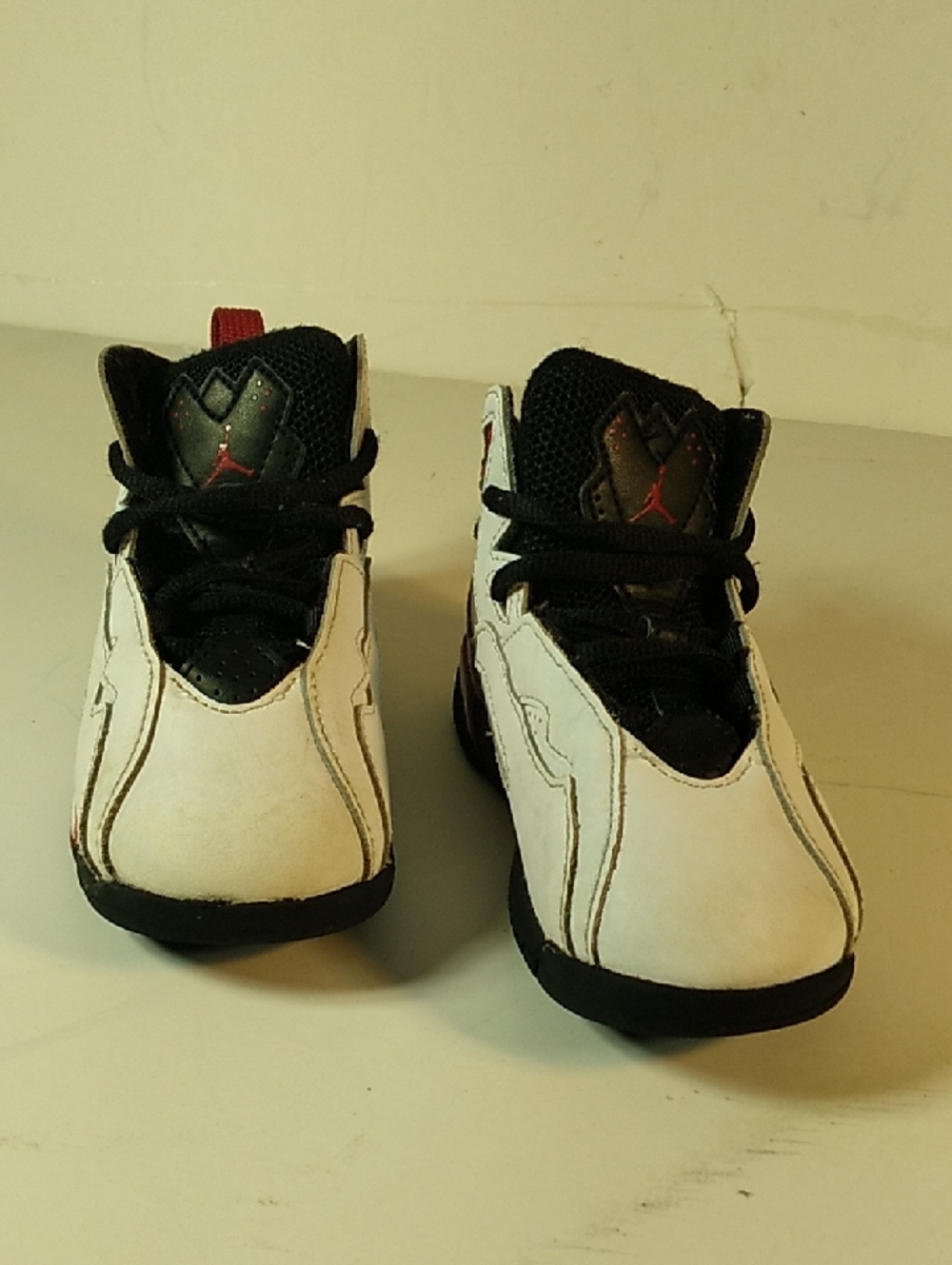 Jordan Kids White and Black High-Top Sneakers Size 1oc.